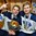 GRAND FORKS, NORTH DAKOTA - APRIL 24: Finland's Eetu Tuulola #19 and Markus Niemelainen #21 celebrate with the trophy after a 6-1 victory over Sweden during gold medal game action at the 2016 IIHF Ice Hockey U18 World Championship. (Photo by Matt Zambonin/HHOF-IIHF Images)